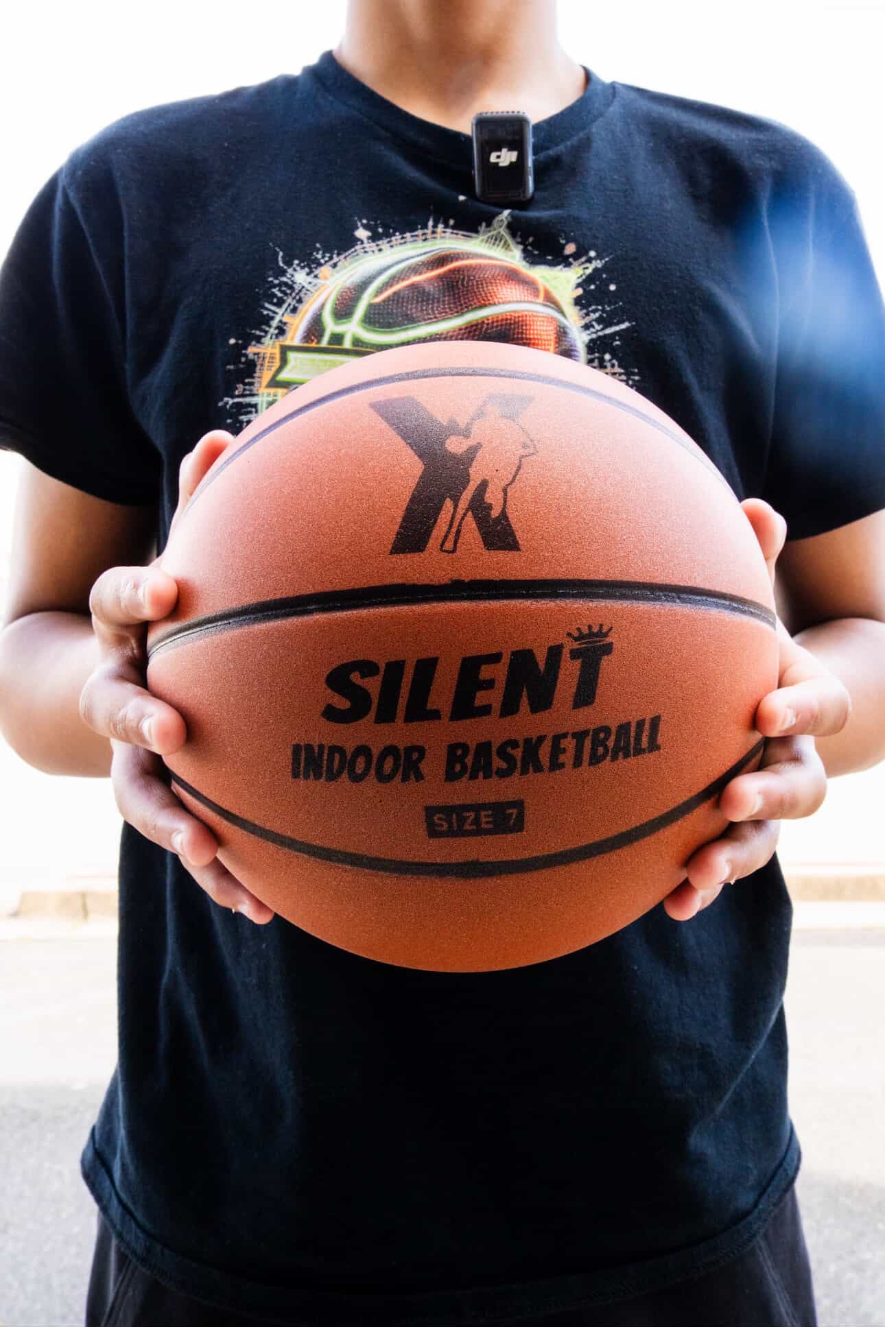 Customer holding the YGA Silent Basketball