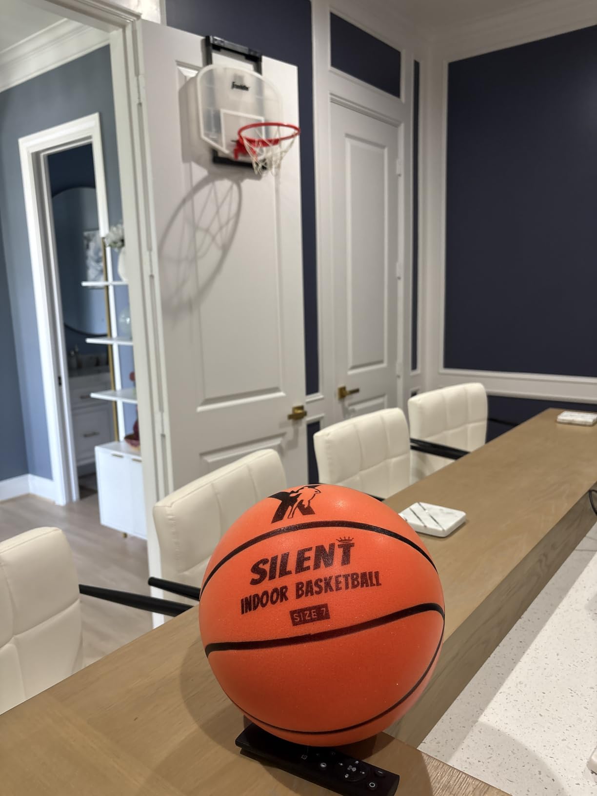 YGA Silent Basketball set up in front of an indoor mini hoop