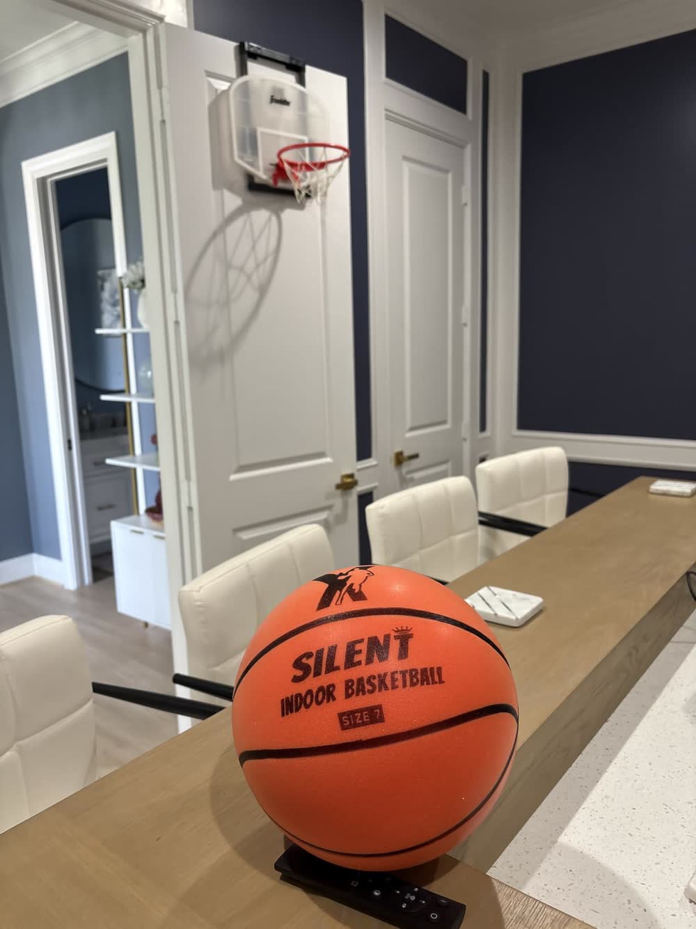 YGA Silent Basketball set up in front of an indoor mini hoop