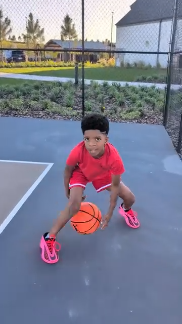 Kid dribbling the YGA Silent Basketball