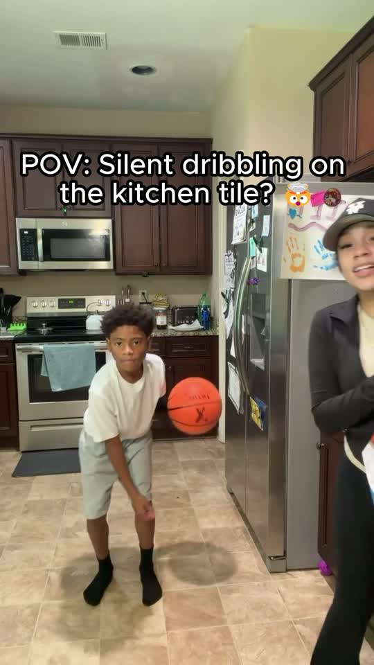 Video review - kid dribbling the YGA Silent Basketball in the kitchen